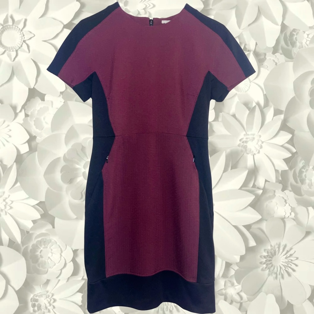 Halogen | Short sleeve color blocked sheath dress with front zipper pockets.
